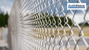 newly installed white chain-link fence